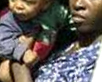 Policía apresa madre haitiana lanzó hijo de 11 meses a cloaca y le ocasiona la muerte.